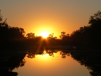 Sunset over our private lake