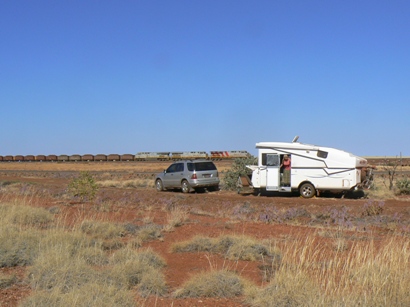 End of dirt road camp site near iron ore railway