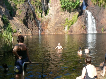 John about to swim across the pool to Wangi Falls